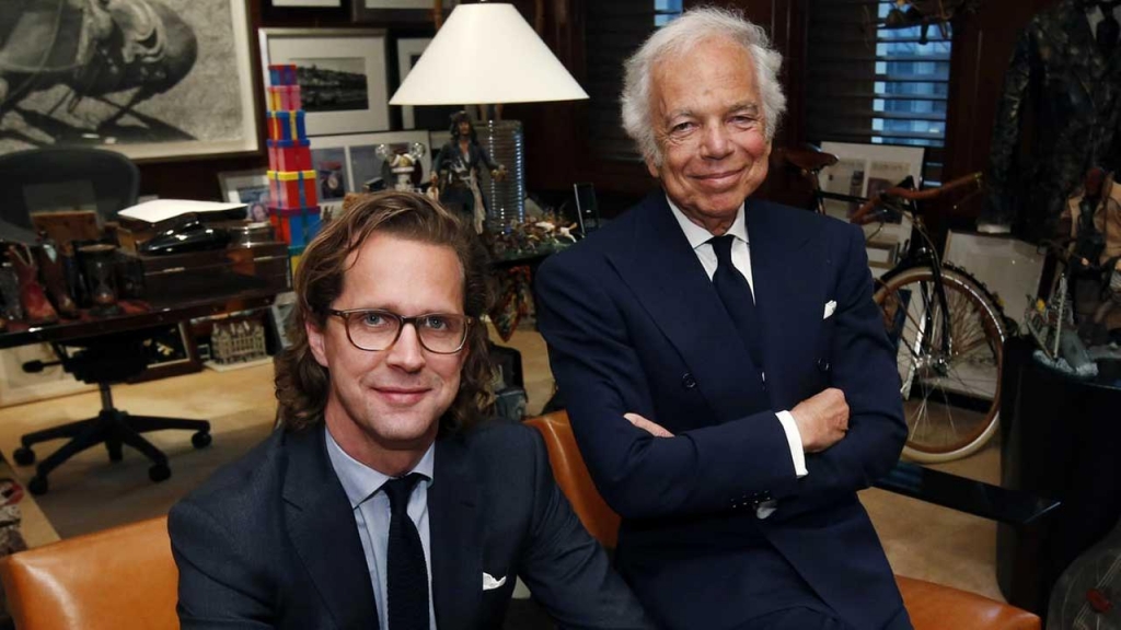 Designer Ralph Lauren right poses in his office with Stefan Larsson global brand president for Old Navy Tuesday Sept. 29 2015 in New York