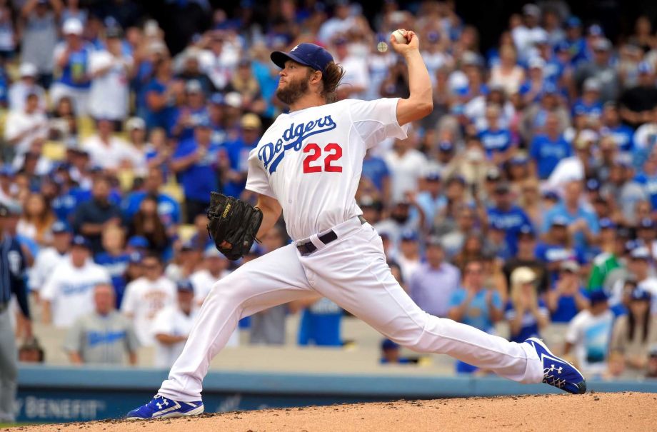 Los Angeles Dodgers starting pitcher Clayton Kershaw throws his 300th seasonal strikeout during the third inning of a baseball game against the San Diego Padres Sunday Oct. 4 2015 in Los Angeles