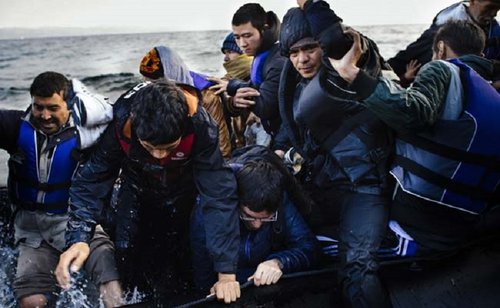 The Latest: EU approves $450 million more for refugee crisis