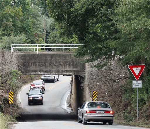 A police vehicle blocks a flooded road on Wednesday Sept. 30 2015 in Guilderland N.Y. The National Weather Service has issued flood watches for much of the eastern half of upstate New York as a storm dumps more than two inches of rain across the regio