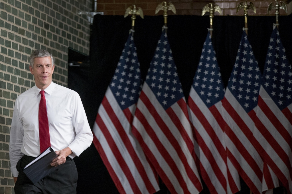 Secretary of Education Arne Duncan takes the stage at North High School in Des Moines Monday Sept. 14 2015 to discuss college access and affordability