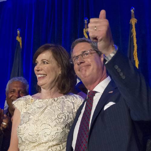 David Vitter celebrates with wife Wendy after reaching a runoff with Democrat John Bel Edwards in the gubernatorial election Saturday Oct. 24 2015 in Kenner La