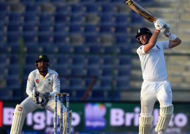 England's Joe Root right in action during the final day of first test match against Pakistan at Zayed Cricket Stadium in Abu Dhabi