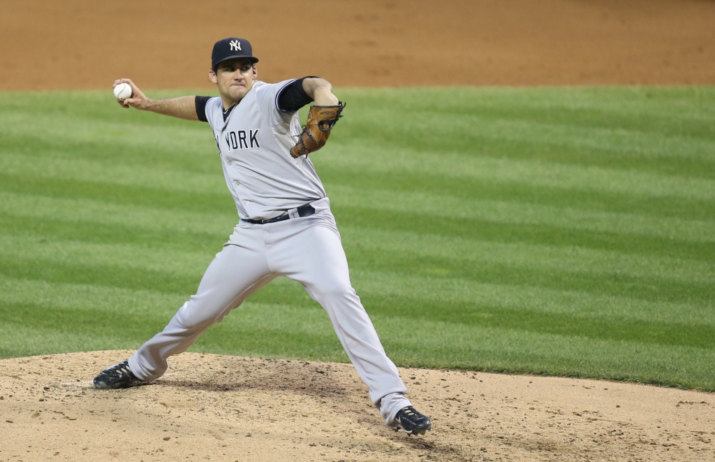 Aug 13 2015 Cleveland OH USA New York Yankees starting pitcher Nathan Eovaldi pitches against the Cleveland Indians during the fourth inning at Progressive Field. Mandatory Credit Charles LeClaire-USA TODAY Sports