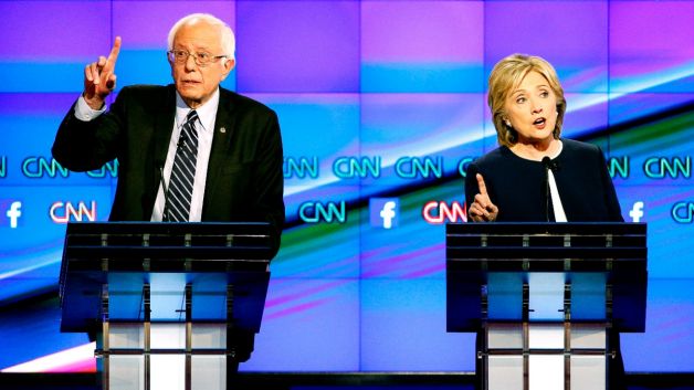 Democratic presidential candidates from left former Virginia Sen. Jim Webb Sen. Bernie Sanders of Vermont Hillary Rodham Clinton former Maryland Gov. Martin O'Malley and former Rhode Island Gov. Lincoln Chafee take the stage before the CNN Democrati