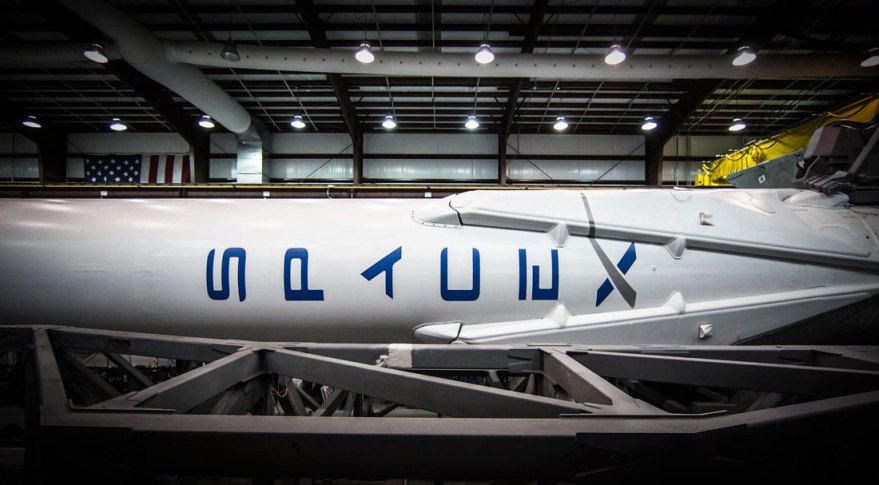 Falcon 9 in SpaceX's Cape Canaveral hangar in advance of the 2014 Orbcomm OG2 Mission 1. Credit SpaceX