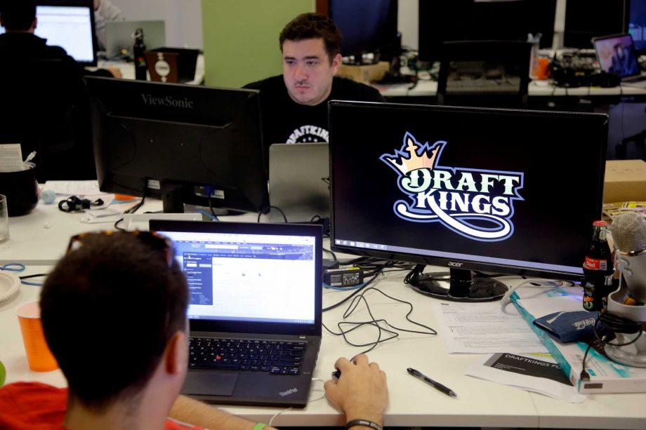 Len Don Diego marketing manager for content at DraftKings a daily fantasy sports company works at his station at the company's offices in Boston. The daily fantasy sports industry is eyeing a breakout season