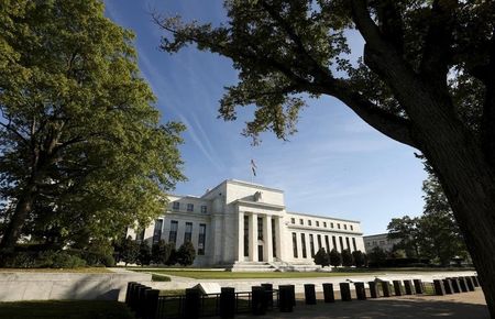 Fed awaiting evidence global chill not knocking US off track