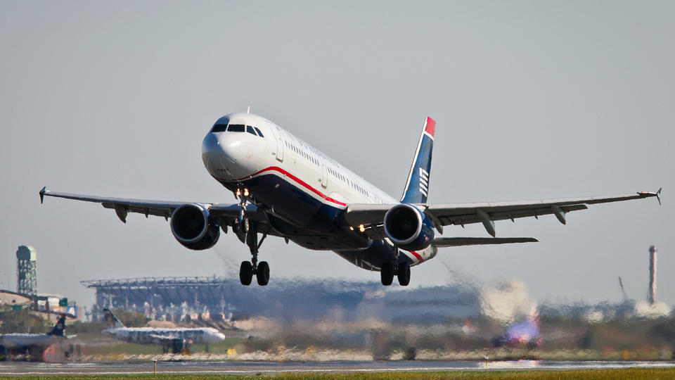 US Airways now flying the flag of American Airlines