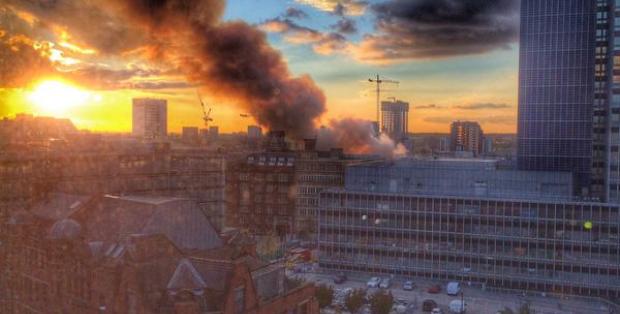 Manchester city centre fire: Dozens of firefighters tackling blaze at historic