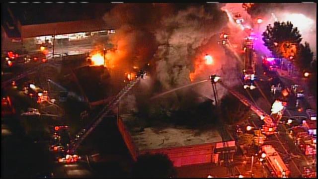 Two firefighters were killed battling a massive two alarm apartment fire in Kansas City Missouri a spokesman for city