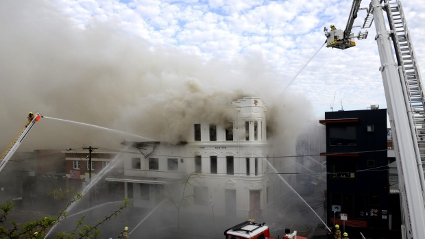 Firefighters battle the blaze engulfing the Albion on Monday