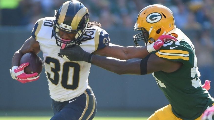 Oct 11 2015 Green Bay WI USA St. Louis Rams running back Todd Gurley pushes away Green Bay Packers linebacker Nate Palmer in the third quarter at Lambeau Field. Mandatory Credit Benny Sieu-USA TODAY Sports