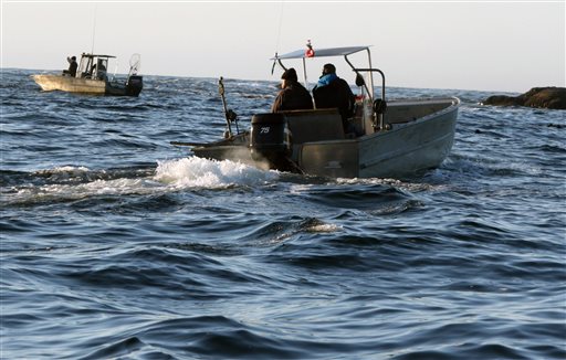 Ahousaht First Nation boats patrol an area near where the whale watching boat Leviathan II sank near Tofino British Columbia Monday Oct. 26 2015. The whale watching boat with over two dozen people on board sank off Vancouver Island the British Foreig