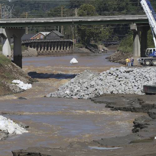 Two missing as floodwaters persist in South Carolina