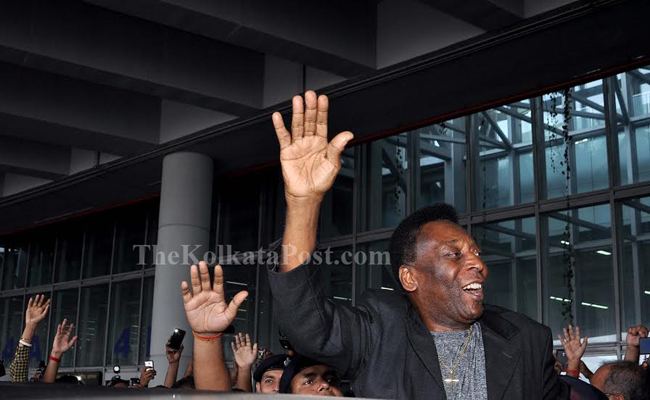 Football legend Pele waving towards fan at Kolkata airport on Sunday dated Oct 11 2015