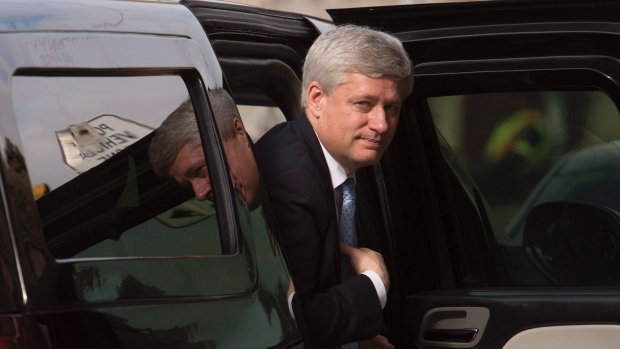 Outgoing prime minister Stephen Harper arrives at his Langevin office in Ottawa Wednesday Oct. 21 2015. Harper will formally step down next week just before Justin Trudeau's Liberal government takes office