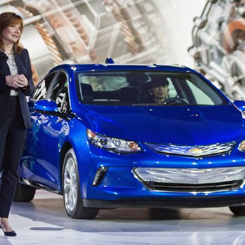 General Motors CEO Mary Barra talks about the 2016 Chevrolet Volt hybrid car at the North American International Auto Show in Detroit. General Motors on Thursday Oct. 1 2015 told investors it plans to