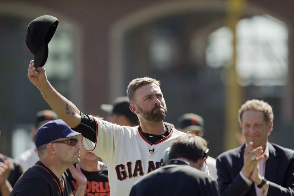 SAN FRANCISCO CA- OCTOBER 4 Pitcher Jeremy Affeldt #41 of the San Francisco Giants tips his hat to the crowd during his retirement ceremony before a game against the Colorado Rockies at AT&T Park