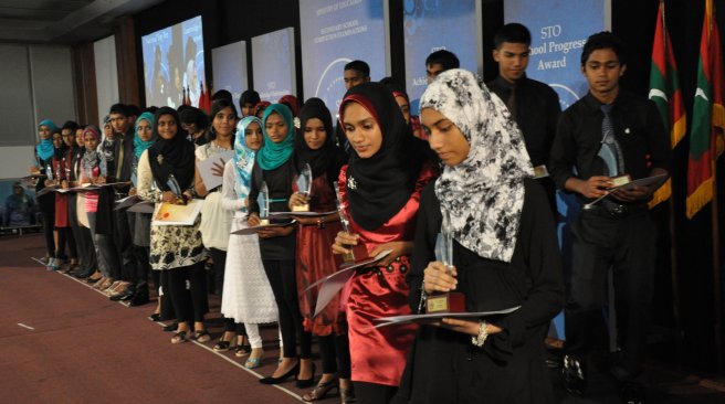 Students at a school prize giving ceremony HRCM has declared that national progress is only possible with high women inclusion. FILE