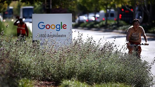 The new Google logo is displayed on a sign outside of the Google headquarters