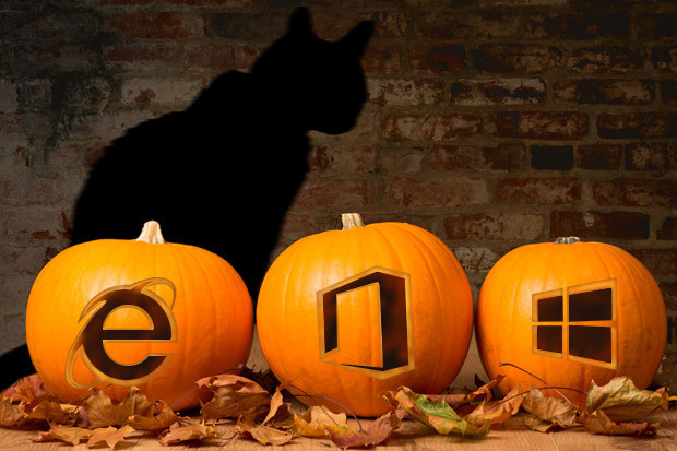 Halloween pumpkins against a brick wall with the shadow of a black witches cat  	  		Credit	  		  		springfield