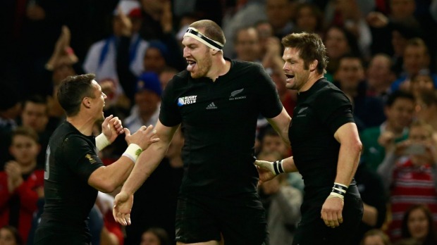 Dan Carter left and Richie McCaw right finally had a reason to smile in Cardiff after helping the All Blacks exorcise the ghosts of their World Cup exit at the hands of the French in 2007 with a dominant display