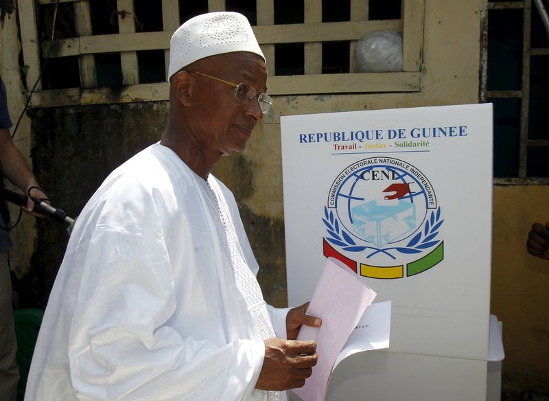 Former prime minister and presidential candidate Cellou Dalein Diallo prepares to cast his vote at a polling station during a presidential election in Conakry Guinea. – Reuters pic