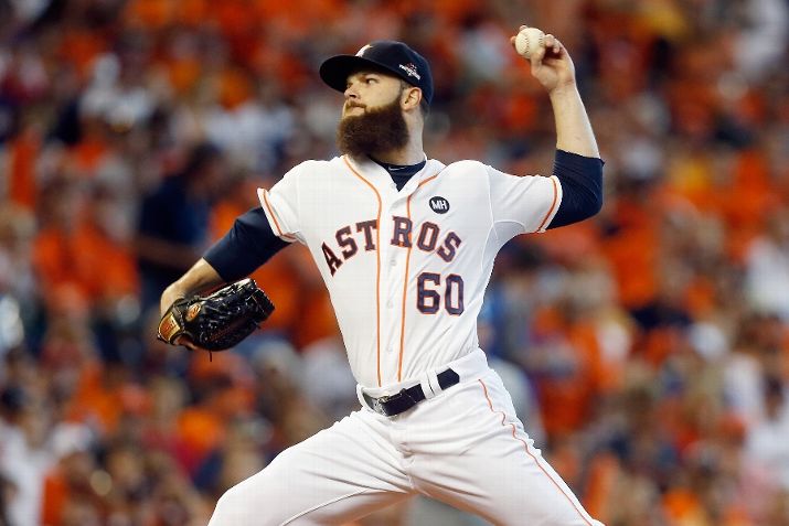 HOUSTON TX- OCTOBER 11 Dallas Keuchel #60 of the Houston Astros throws a pitch in the first inning against the Kansas City Royals in game three of the American League Division Series at Minute Maid Park