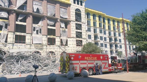 Houston fire dept. is on the scene of the Scaffold collapse outside of building under construction across from MInute Maid Park