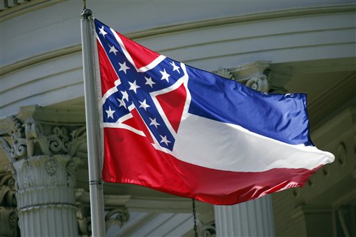 2015 the Mississippi state flag is unfurled against the front of the Governor's Mansion in Jackson Miss. A new proposal seeks a statewide election on removing the Confederate battle emblem from the Mississippi flag. Bu