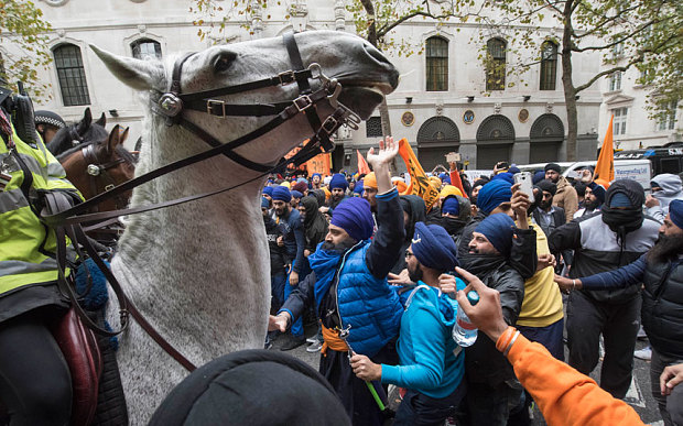 Hundreds of British Sikhs clashed with police outside the India High Commission