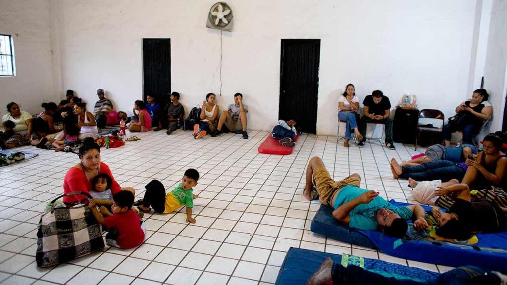 Residents and tourists take refuge in a small shelter run by the Red Cross as they await the arrival of Hurricane Patricia in Puerto Vallarta Mexico on Oct. 23 2015