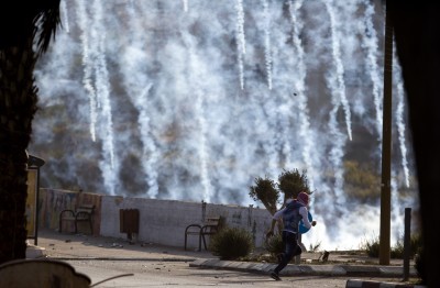 Palestinians torch Jewish shrine; stab Israeli soldier