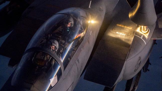 Air Force F-15E Strike Eagle receiving fuel over northern Iraq