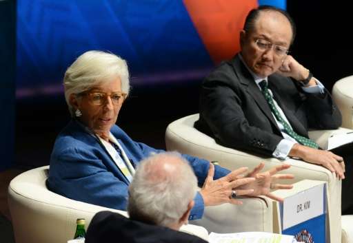 IMF Managing Director Christine Lagarde and World Bank President Jim Yong Kim participate in a panel discussion on clima