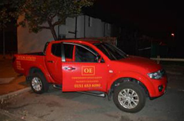 The stolen red Mitsubishi pick-up truck