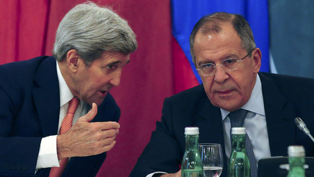 U.S. Secretary of State John Kerry left talks to Russian Foreign Minister Sergey Lavrov during