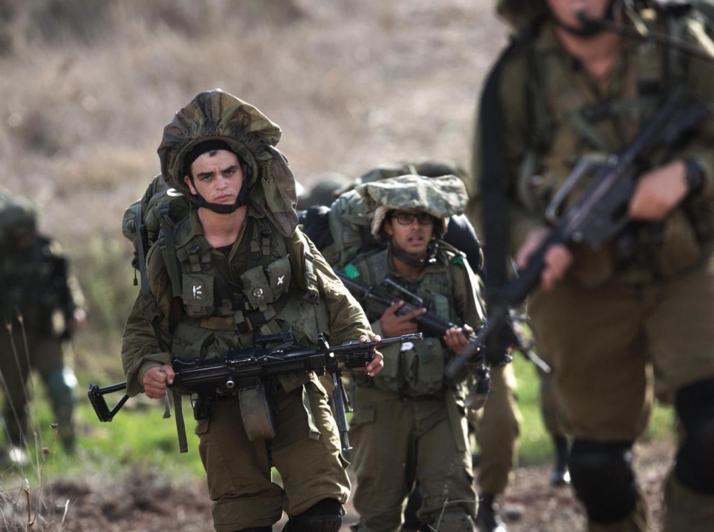 Israeli soldiers take part in a military exercise in the Golan Heights