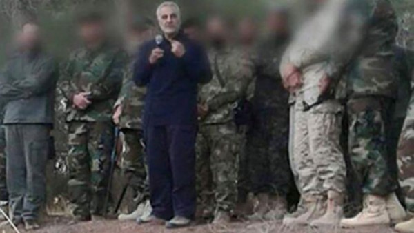 Maj. Gen. Qassem Soleimani seen in blue suit is commander of Iran's Islamic Revolutionary Guards Corps or Qods Force. Soleimani's presence in Syria is an indicator of how serious Iran's involvement in the civil war