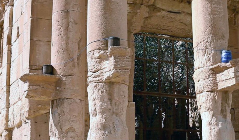 Islamic State extremists rigged explosives to Roman-era columns tied 3 captives to them then blew them up in Palmyra Syria