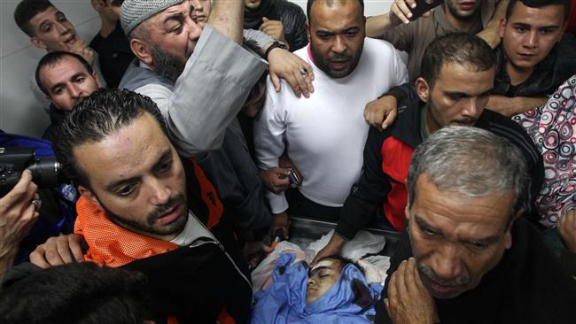 Relatives mourn over the body of Palestinian Mohammed Fares al-Jaabari who died during clashes with Israeli forces near the Israeli settlement of Kiryat Arba at al Ahli hospital in the occupied West Bank city of al Khalil