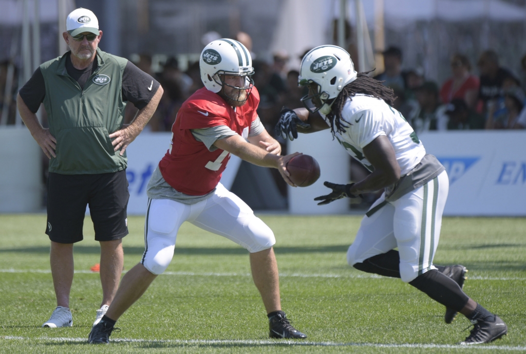 Ivory gets a training-camp handoff from Ryan Fitzpatrick as Chan Gailey