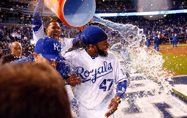 Kansas City's Salvador Perez douses pitcher Johnny Cueto