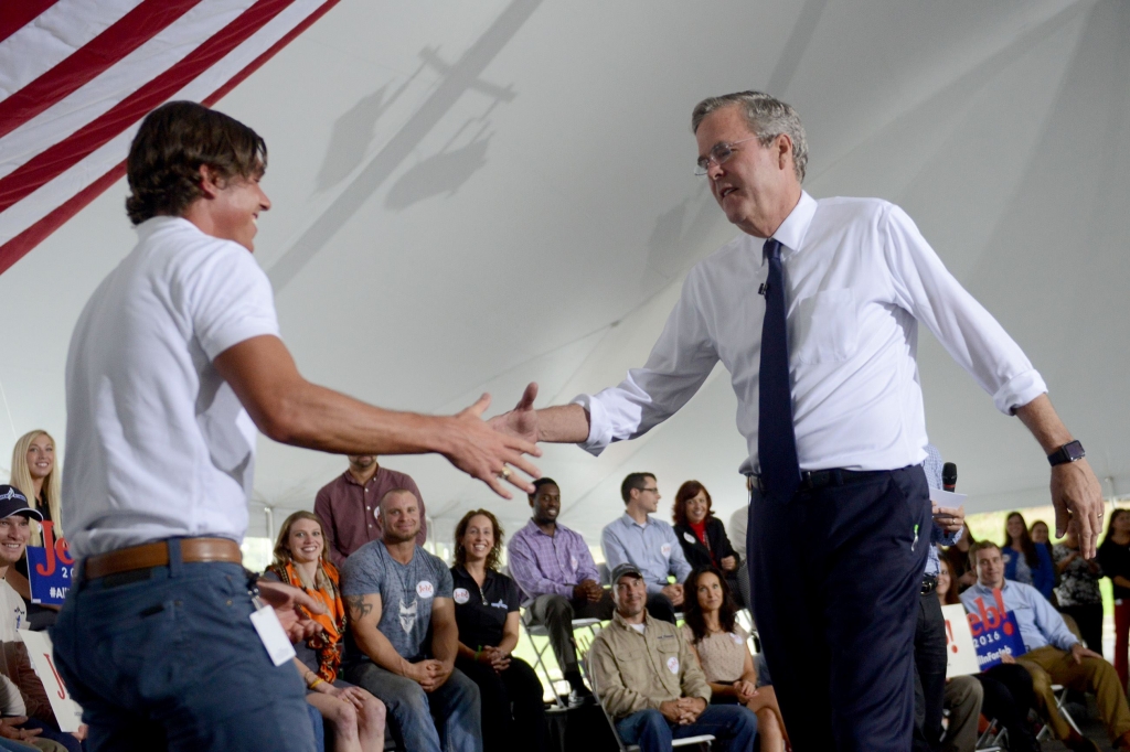 20150929MWHbushLocal19-16 Republican presidential candidate Jeb Bush shakes hands with petroleum engineer Ryan Rice during a campaign event at Rice Energy in Canonsburg