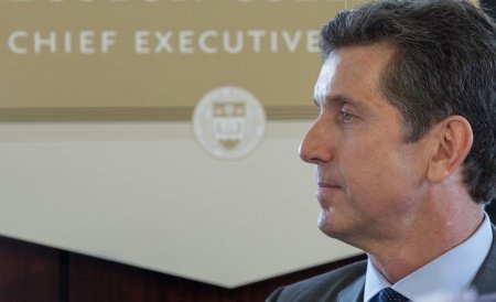 Alex Gorsky CEO of Johnson & Johnson listens as he is introduced to speak at the Boston College Chief Executives Club of Boston luncheon in Boston Massachusetts