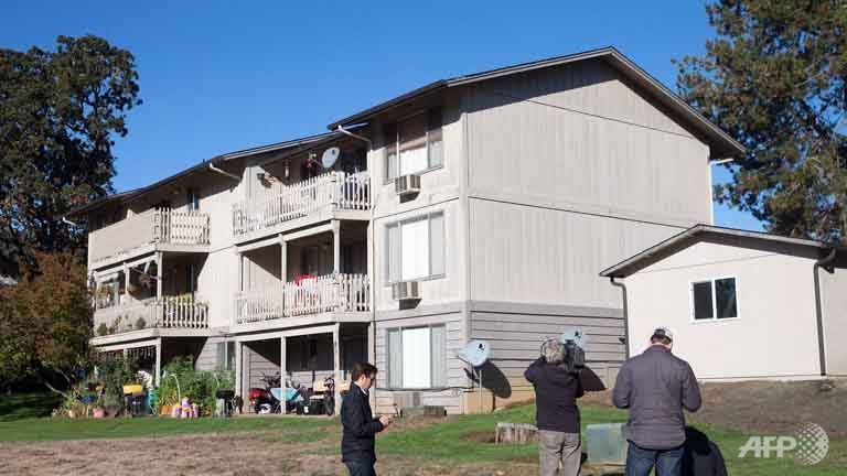 Journalists report fom outside the apartment where 26-year-old Chris Harper Mercer lived in Winchester Oregon Oct 2 2015