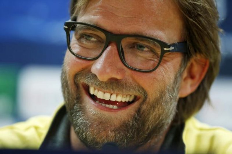 Jurgen Klopp signs three-year deal at Anfield