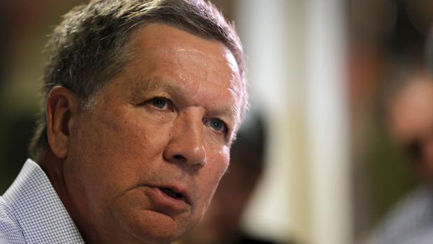 Ahead of debate, John Kasich takes on Donald Trump