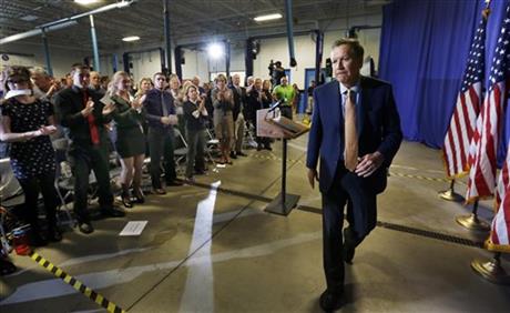 Republican presidential candidate Ohio Gov. John Kasich leaves after announcing his federal budget plan Thursday Oct. 15 2015 at Nashua Community College in Nashua N.H